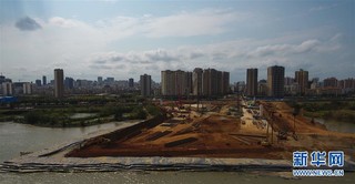（经济）（1）海口：文明东越江通道围堰吹填预计月底完工
