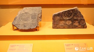 晋阳古城三号基址出土的北朝至五代期间长方形空心砖（残件）。