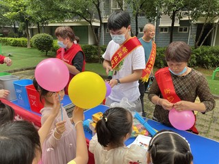 新罗区西陂街道新洋社区“六一”游园活动。龙岩市委组织部供图