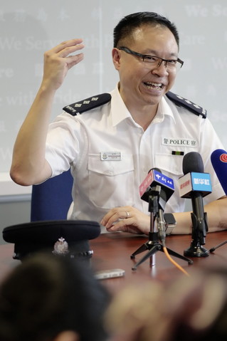 在香港警察总部,香港警务处沙田警区行动主任总督察,谈判专家林景升