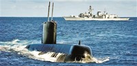 英国海军“伏击”号核潜艇和“肯特”号护卫舰。