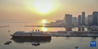 3月10日，“翠德丹”号邮轮驶入大连港国际邮轮中心码头（无人机照片）。新华社记者 潘昱龙 摄
