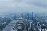 6月19日，航拍雨后的南京城区，天空雨雾缭绕，高楼大厦在雨雾中若隐若现，朦胧梦幻。